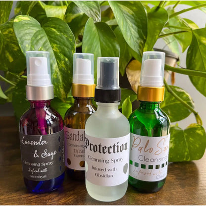 Handcrafted lavender sage cleansing spray in brown glass bottle with silver pump