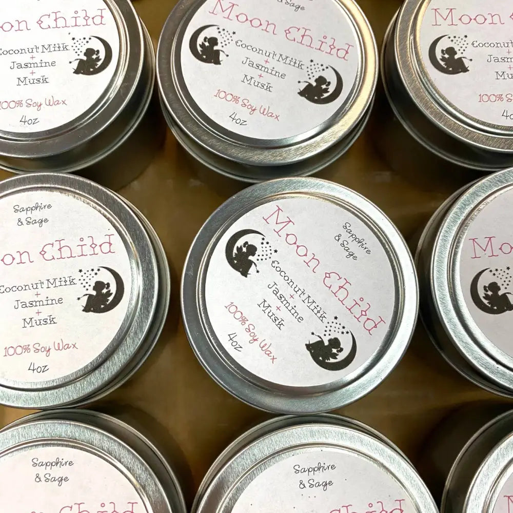 Moon Child coconut milk jasmine musk soy candle in 4oz tin with black obsidian and rose petals