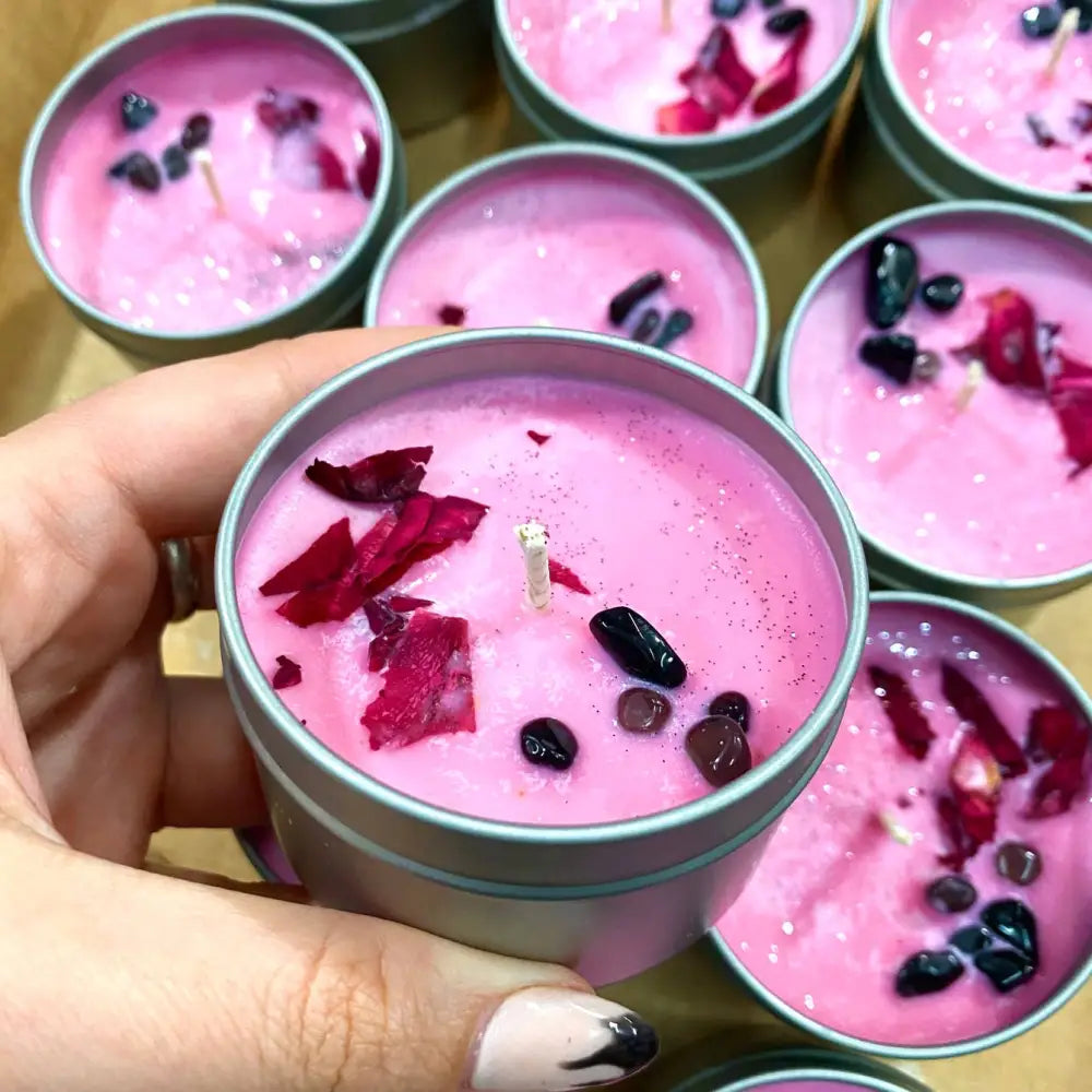 4oz tin candle with pink rose petals, black obsidian, and silver lid