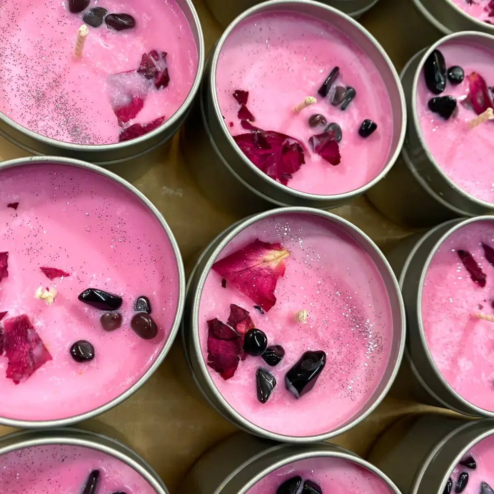 Pink rose petal candle in 4oz tin with black obsidian and berries
