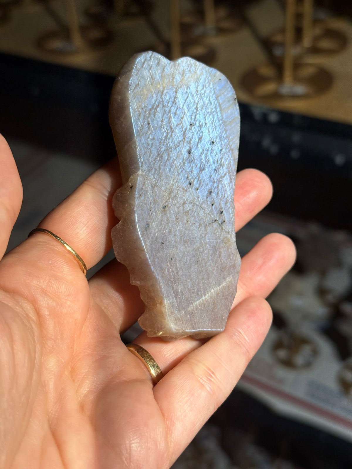 Flat polished back of the moonstone angel carving
