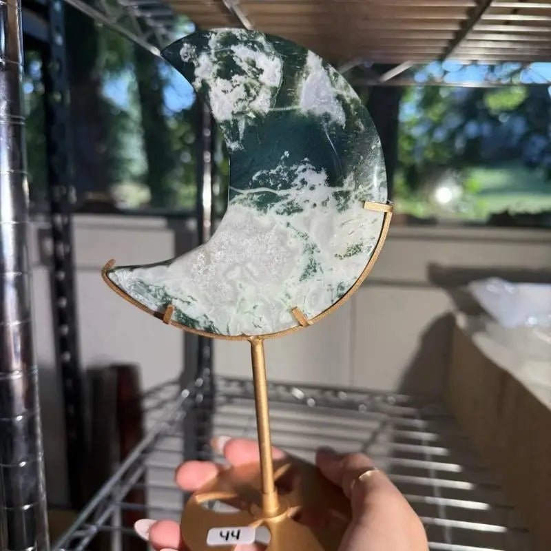 Green and white moss agate moon slice on gold stand figurine