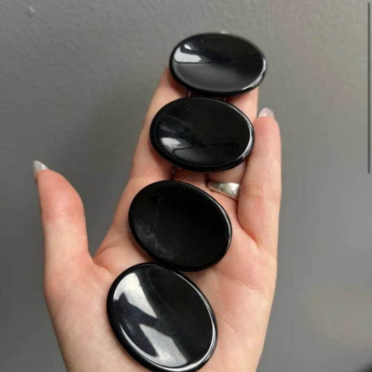 Set of five smooth black onyx worry stones, 2 inches natural gems
