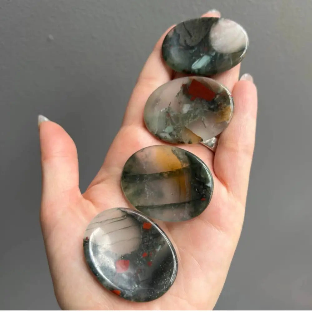 Black and white agate worry stone coaster set, 2 inches with red accents