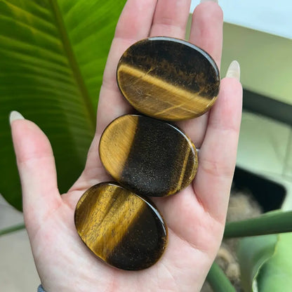 Tiger eye stone coaster set with natural patterns and polished 2-inch finish