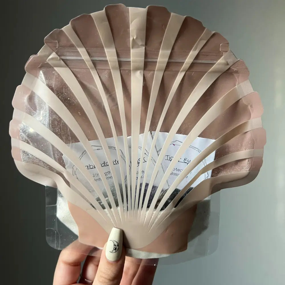 Nude shell-shaped nail polish swatches in Natural Crystal Shells set