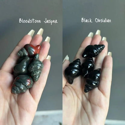 Set of three black obsidian snail figurines in Natural Crystal Shells Ocean Collection
