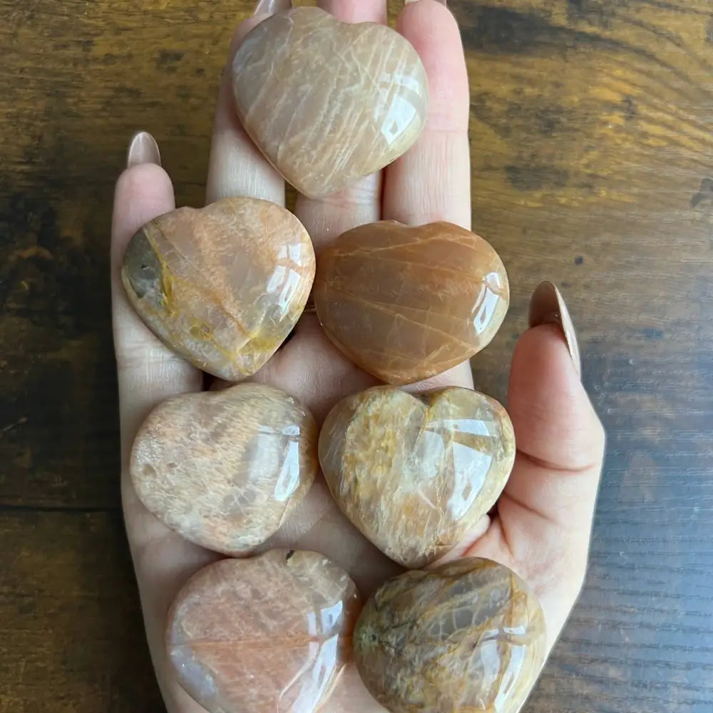 1-inch carved heart pendant in warm golden natural stone