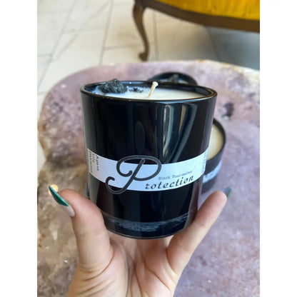 Black soy wax candle in 10oz glass jar with white label and gold p logo