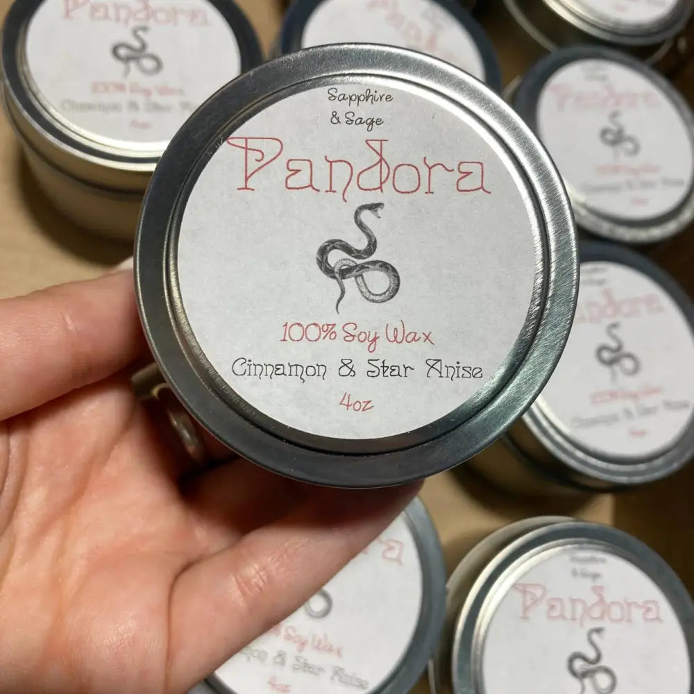 Pandora 4oz soy wax candle with cinnamon star anise scent in rose quartz crystal holder