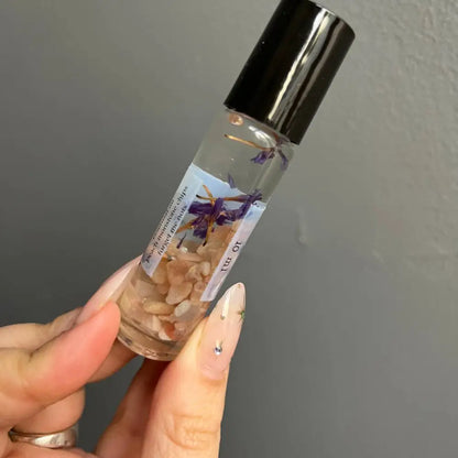 Peach Moonstone crystal perfume roller with lavender scent and dried petals