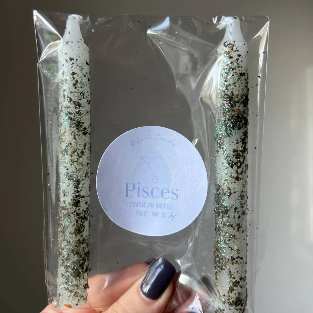 Pisces Zodiac Ritual Candle Set with green white speckled candles in clear pack