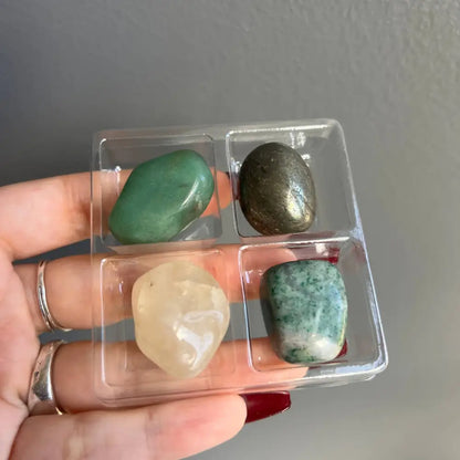 Clear plastic tray with compartments for green aventurine, rose quartz stones in Natural Stone Collection