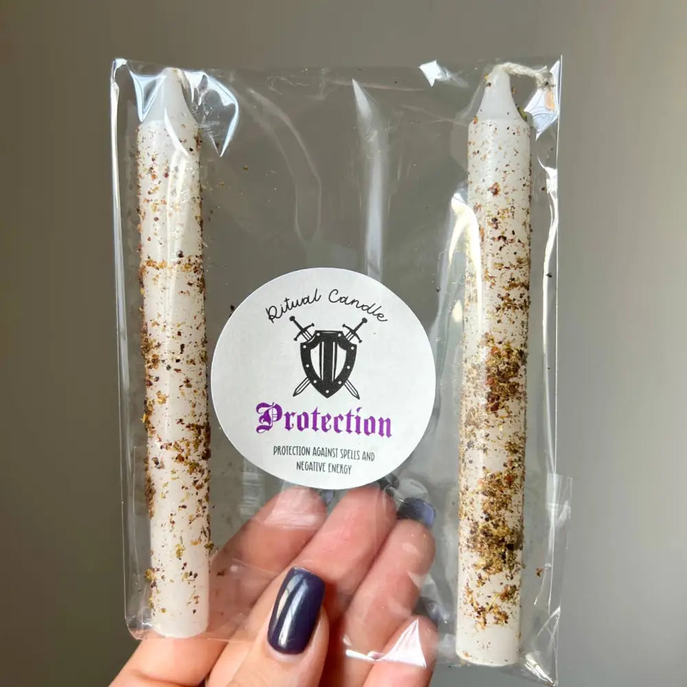 Handmade 5-inch ritual candle from Nashville with speckled white wax design