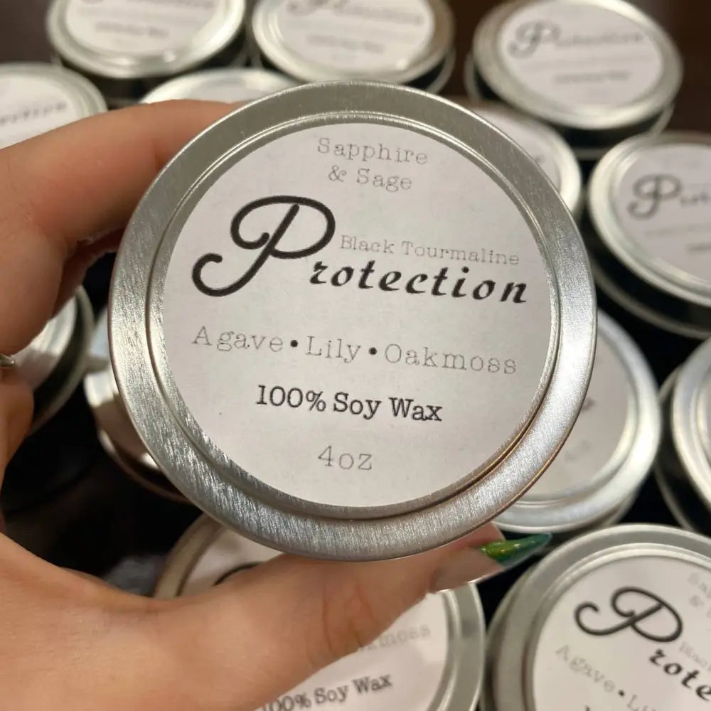 4 oz natural soy wax tin candle in silver with agave lily oakmoss scent