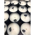 4 oz natural soy wax tin candle with white wax, black rock decor, silver lid