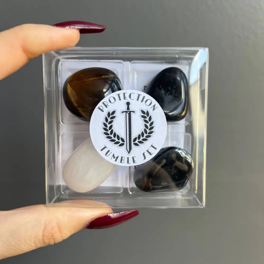 Clear plastic box of Genuine Crystal Healing Stone Collection Set of 4 with sword laurel label