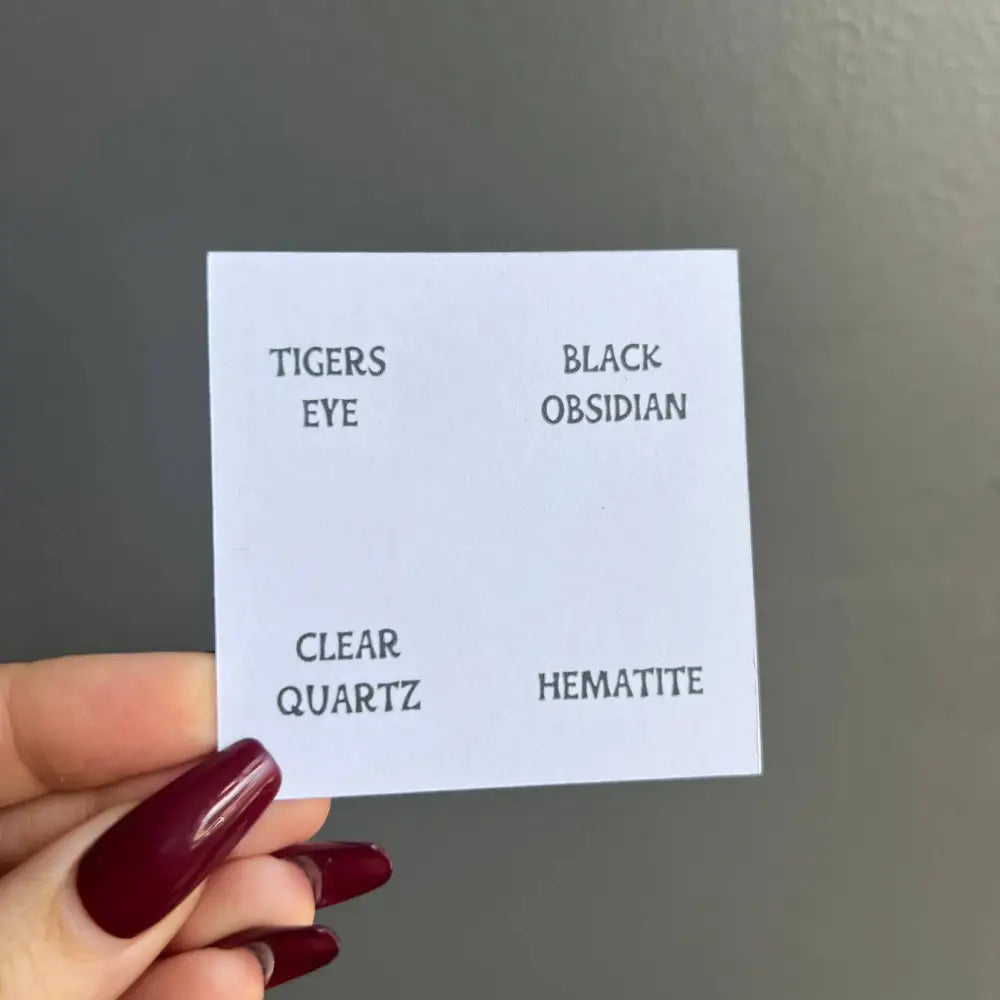 White square card with gemstone names and descriptions in Genuine Crystal Healing Stone Collection Set of 4