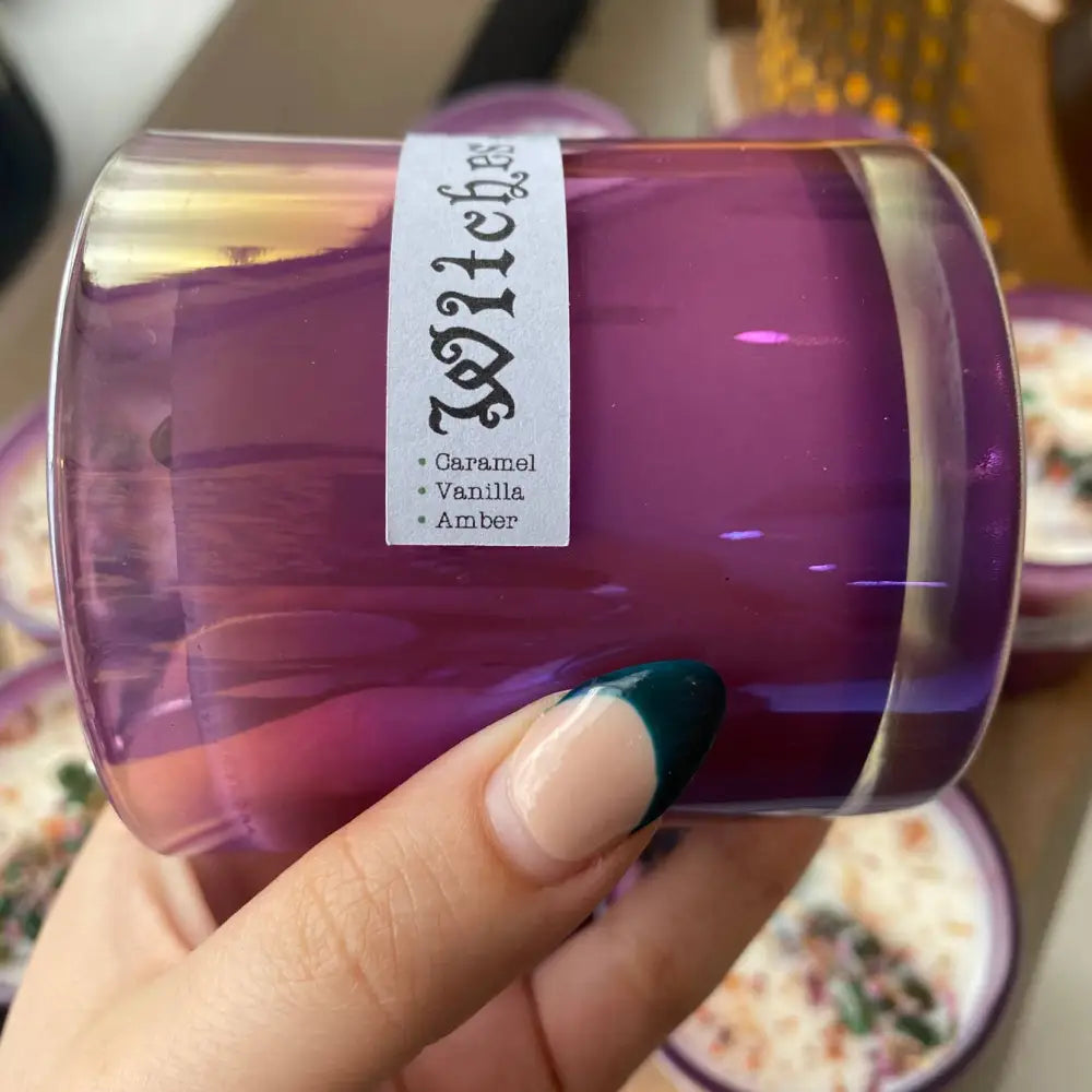 Purple witches 10 oz soy wax candle with caramel vanilla amber scents