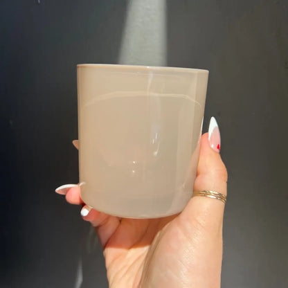 Beige frosted glass minimalist candle holder from Custom Crystal Candle Creation Guide