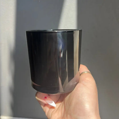 Glossy black glass tumbler with silver rim for Custom Crystal Candle Creation Guide