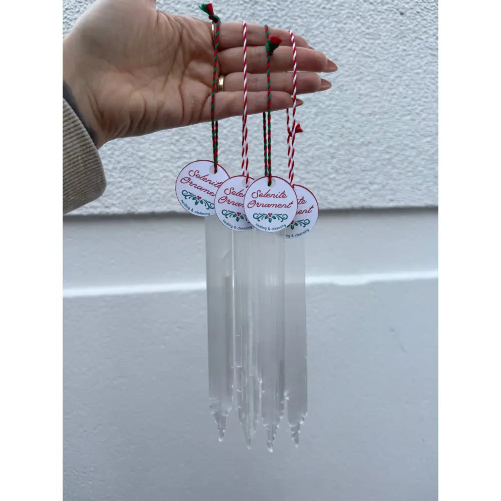 Selenite icicle wind chimes with red white string