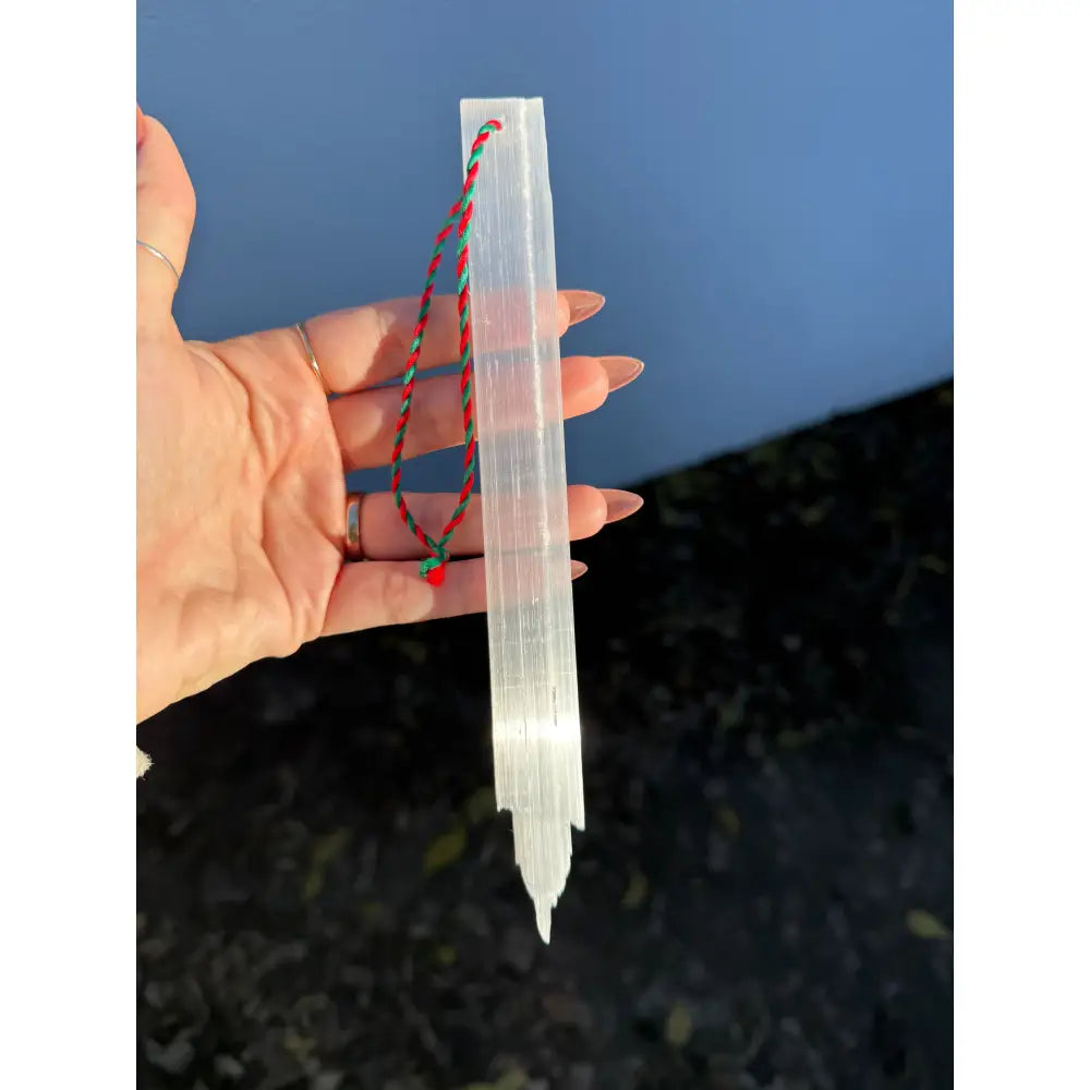 Clear quartz pendant necklace with red green beads on selenite icicle ornament