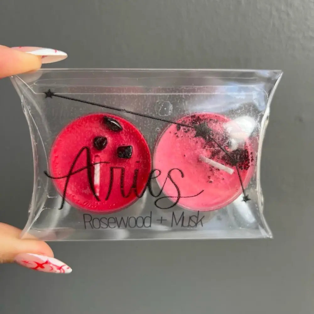 Rosewood musk bath bomb set in clear packaging with Pure Soy Wax Candles