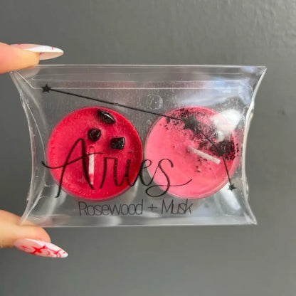 Rosewood musk bath bomb set in clear packaging with Pure Soy Wax Candles