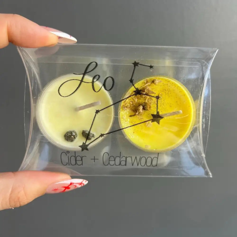 Leo constellation soy candle set in yellow and white starry design