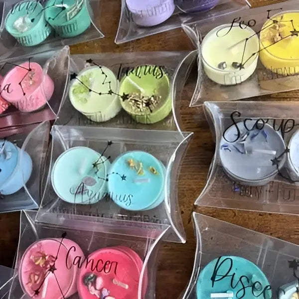 Zodiac tea light candle set with twelve crystal-infused tea lights for each astrology sign