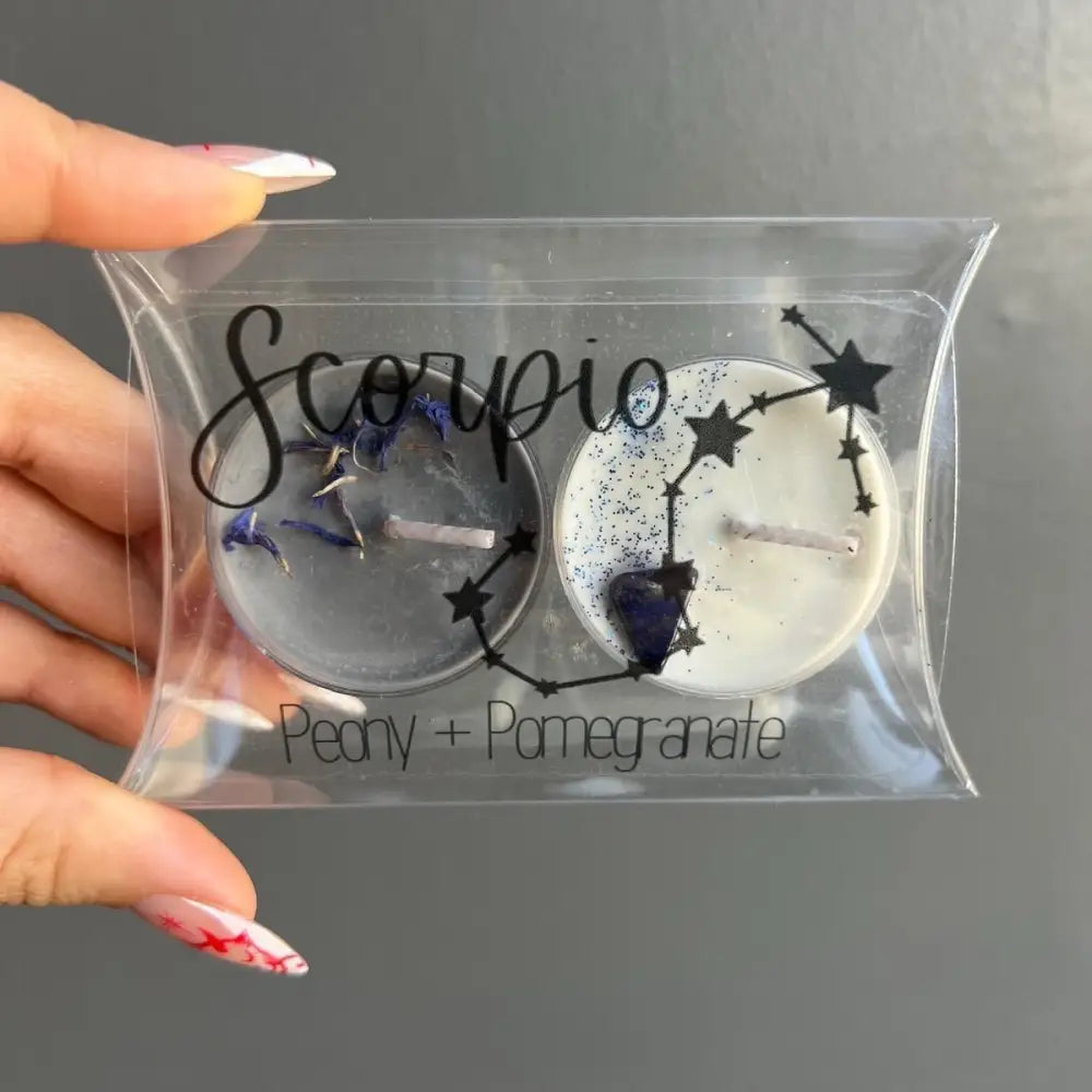 Scorpio pecan pomegranate soy wax candle in starry packaging