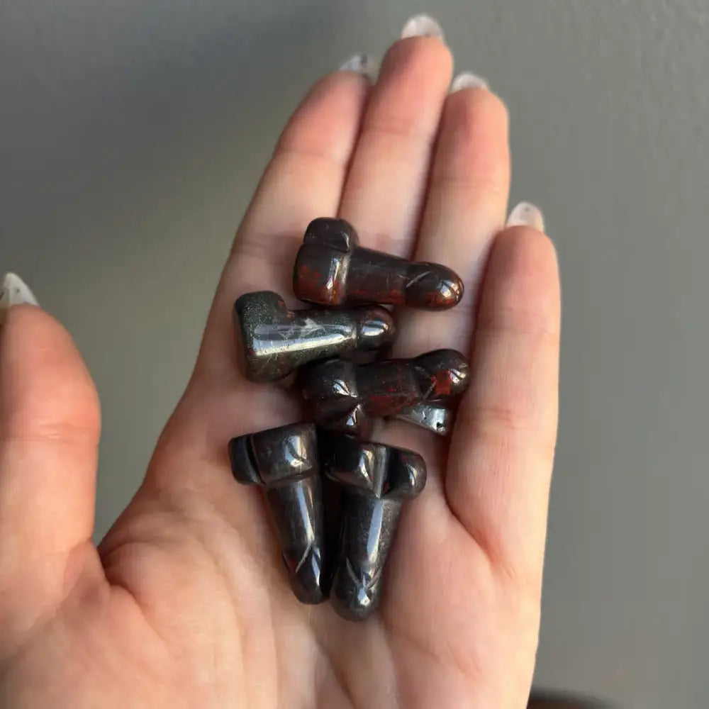 1-inch dark brown glossy acorn-shaped crystal phallus carving