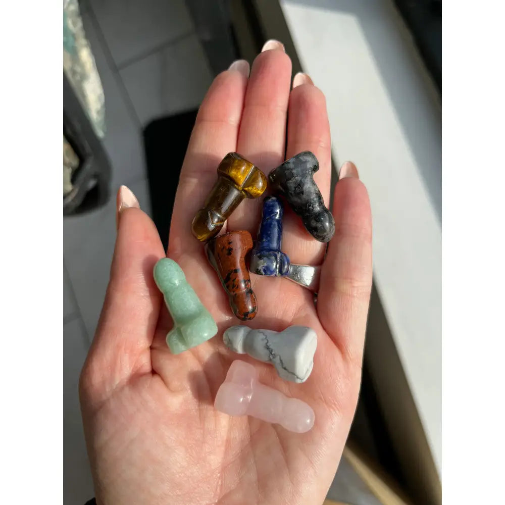 Multi-colored bone-shaped stone beads in 1 inch natural crystal phallus carving