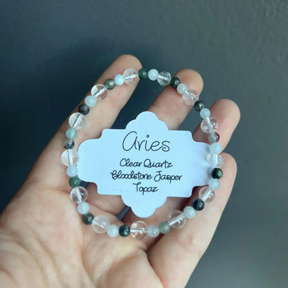 Aries zodiac bracelet with clear quartz, bloodstone jasper, topaz beads