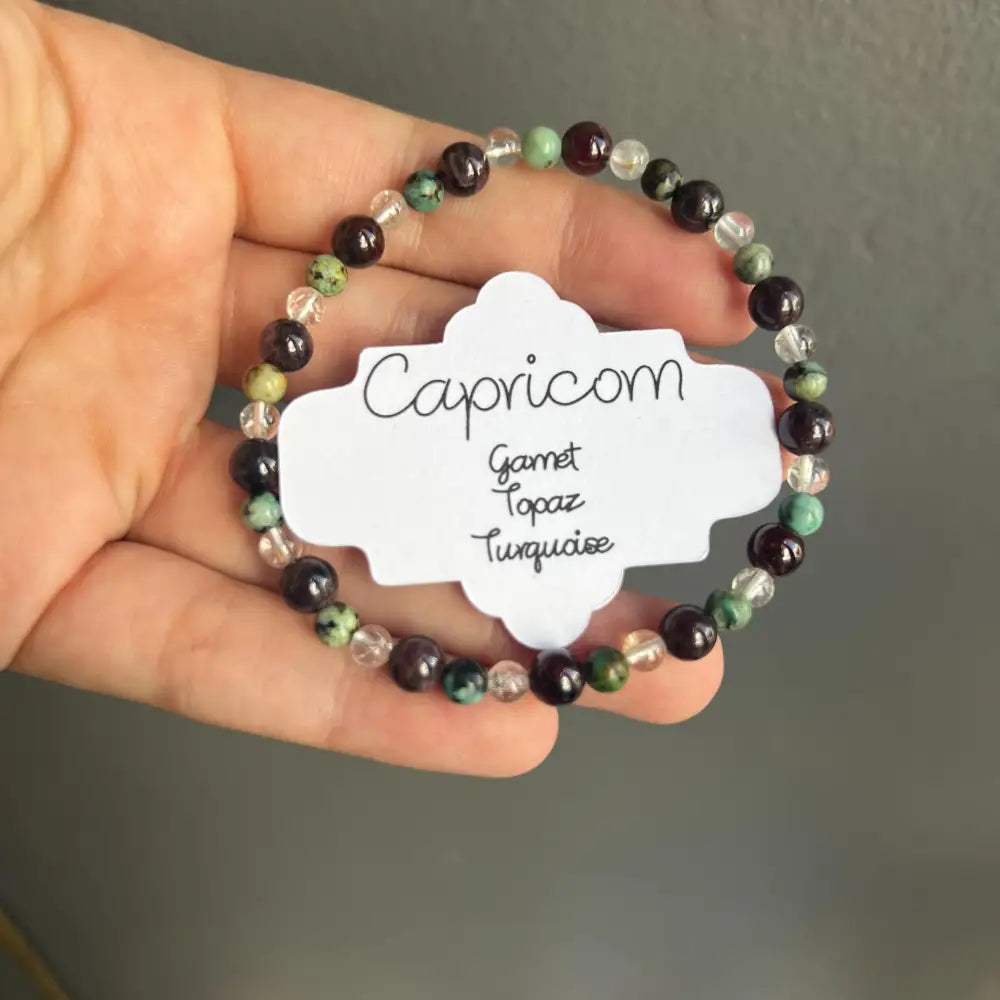 Capricorn gemstone bracelet with garnet, topaz, turquoise beads