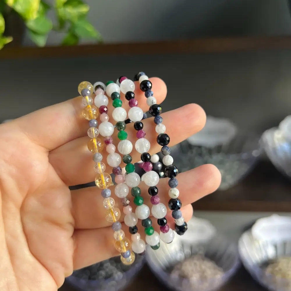 Zodiac crystal bracelet set with multi-colored gemstones, beads, and pearls