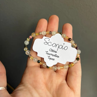 Citrine tumbled stone bracelet with tourmaline, topaz, and Scorpio zodiac beads